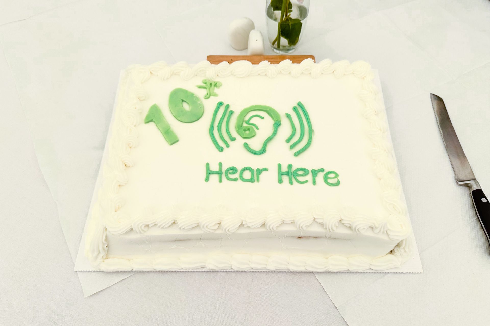 A cake celebrating Hear Here's 10th anniversary 