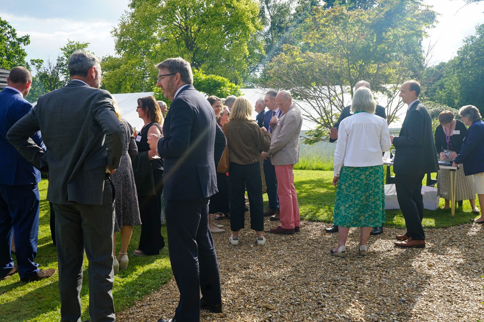 Attendees at the Diocesan Education Team Tent Week event in conversation in the grounds of Willow Grange