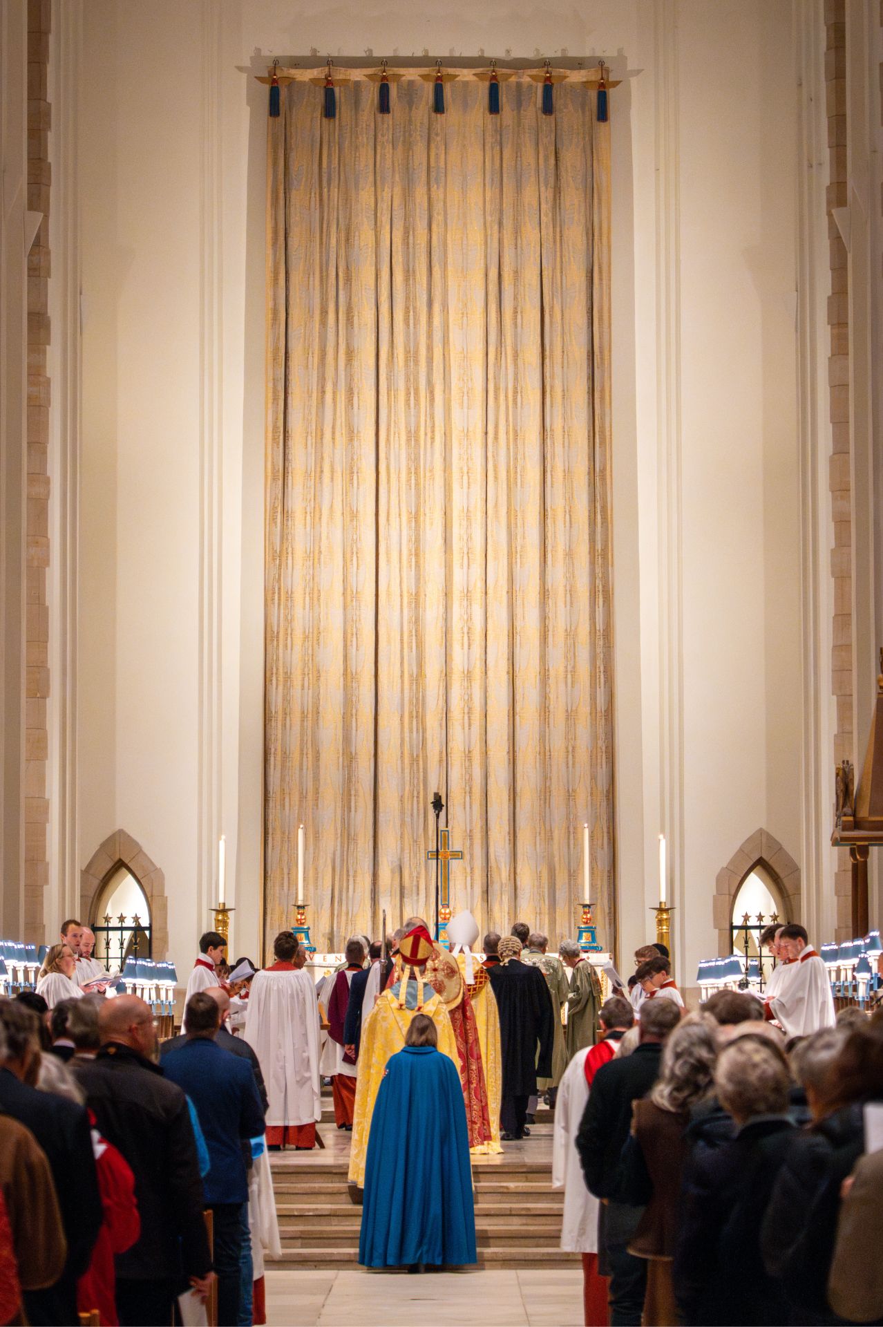 The procession in Guildford Cathedral approach their stalls as the service begins