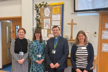 Welcome to new vicar of Chessington - with Head, Deputy and Emma Coy.jpg